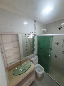 Ένα μπάνιο στο Departamento Crispim