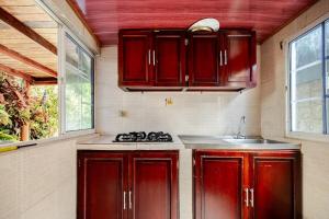 Η κουζίνα ή μικρή κουζίνα στο cabaña villa luz