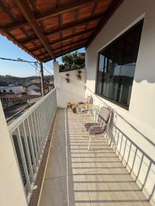 Balkón nebo terasa v ubytování Casa com Vista de Caxambu