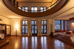 a large living room with a round ceiling at Axminster House in Muizenberg +65 photos