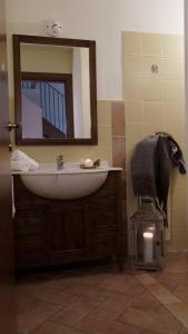 Koupelna v ubytování La Sorgente + 17 fotografií