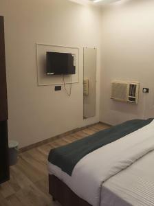 Ένα ή περισσότερα κρεβάτια σε δωμάτιο στο Hotel MRK VILLA