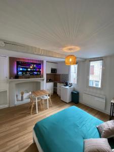 Posezení v ubytování Le Relais Beauvaisien - Hypercentre & Netflix + 9 fotografií