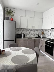 Køkken eller tekøkken på Riviera Apartments + 3 billeder