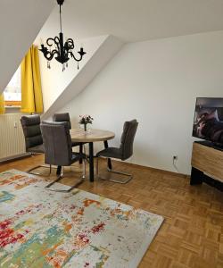 TV a/nebo společenská místnost v ubytování Quelle