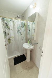 Koupelna v ubytování Punto panorámico, piso 22 con cochera