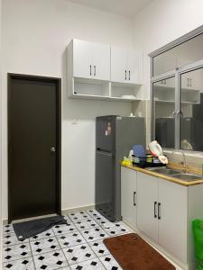 Køkken eller tekøkken på Loka Homestay Kluang