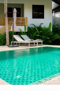 Bazén v ubytování Tulum Villa Resort Koh Samui nebo v jeho okolí