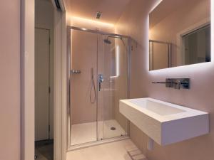 a bathroom with a shower and a white sink at Dimora in Prato in Padova +52 photos