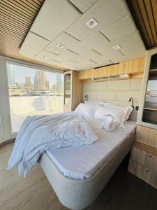 Ένα ή περισσότερα κρεβάτια σε δωμάτιο στο Boat Camping