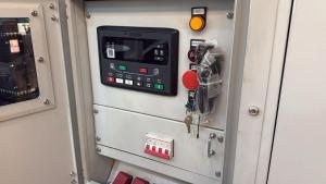 a machine with a control panel on the side of a room at Erliz villa in Kumasi +4 photos