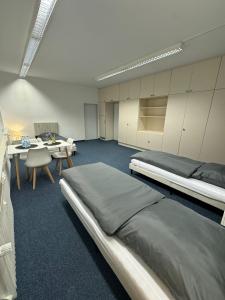 Postel nebo postele na pokoji v ubytování StayFlex Nürnberg - free Parking, close to train and bus + 15 fotografií