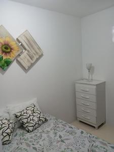 Postel nebo postele na pokoji v ubytování Kit net para curta temporada