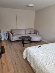 Ένα ή περισσότερα κρεβάτια σε δωμάτιο στο Apartament Sobótka