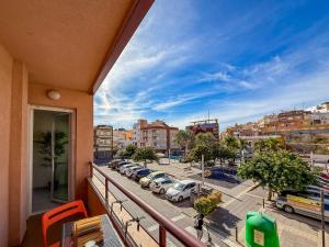 a balcony with a view of a parking lot at PLAYA LEVANTE céntrico y con Parking By Aloha Palma in Águilas