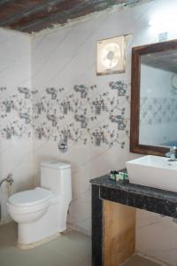 Koupelna v ubytování Royaal Exotic Family Luxry Resort And Camp