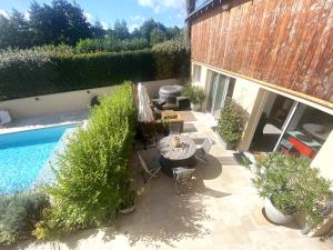 Φωτογραφία από το άλμπουμ του Chambre Chic et Charme dans Moulin σε Rouessé-Vassé