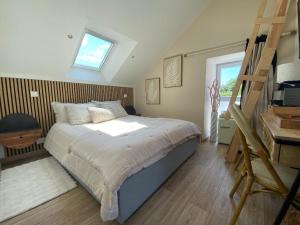 Φωτογραφία από το άλμπουμ του Chambre Chic et Charme dans Moulin σε Rouessé-Vassé