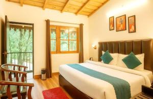 Postel nebo postele na pokoji v ubytování The Boho Woods Resort + 44 fotografií