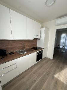 Η κουζίνα ή μικρή κουζίνα στο OFF 32 Suites