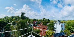 a view of a city with trees and buildings at Villa Calton 32 Villa in Weligama Bay in Weligama