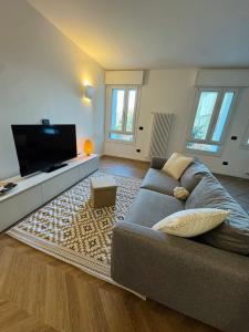 TV a/nebo společenská místnost v ubytování Appartamento Essenza