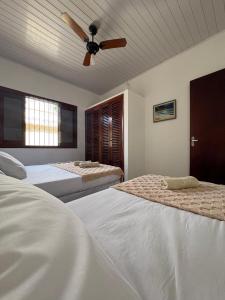 Ένα ή περισσότερα κρεβάτια σε δωμάτιο στο Uu'hull Surf House