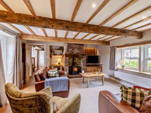 a living room filled with furniture and a fireplace at 3 Bed in Appleby 94764 in Brampton