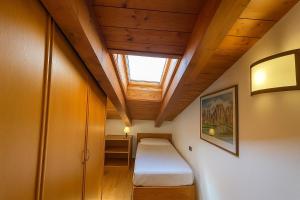 Postel nebo postele na pokoji v ubytování Alessia