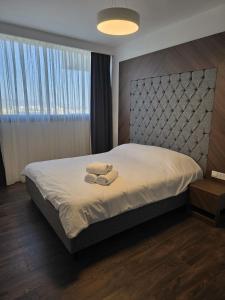 Postel nebo postele na pokoji v ubytování 1 Bedroom Grand Sapphire