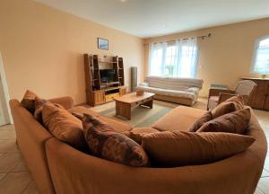 Posezení v ubytování Au casterot