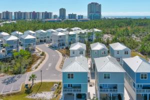 an aerial view of a row of houses in a resort at Waves & Wildlife Getaway at Summer Salt in Orange Beach