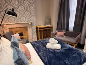 Postel nebo postele na pokoji v ubytování Regency House