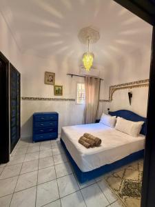 Postel nebo postele na pokoji v ubytování Riad Saadd