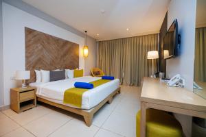 Postel nebo postele na pokoji v ubytování African Princess Beach Hotel + 21 fotografií