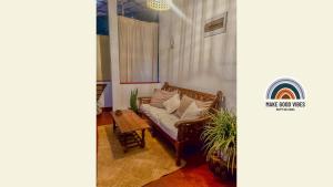 a living room with a couch and a table at Stay Happy at Chathurni Villa, Ahangama in Ahangama