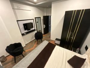 TV a/nebo společenská místnost v ubytování PARQUE Villa By RR