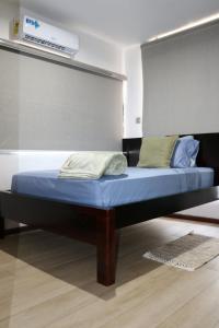 Ένα ή περισσότερα κρεβάτια σε δωμάτιο στο Container Home Retreat