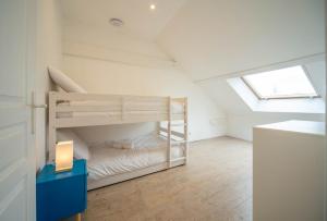 Postel nebo postele na pokoji v ubytování Le Verger Secret