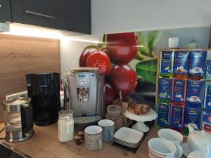 a kitchen counter with a coffee maker on a counter top at Seilhof in Ennsling