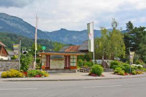 a bus stop on the side of a road at Seilhof in Ennsling