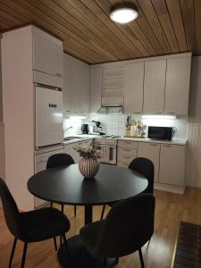 Kuchyň nebo kuchyňský kout v ubytování Talitintti Levi, 1 bedroom apartment, family friendly