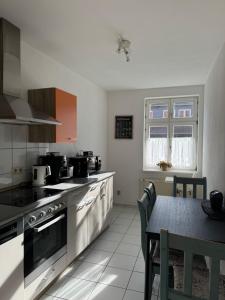 Η κουζίνα ή μικρή κουζίνα στο Ferienwohnung Agora inkl Parkplatz