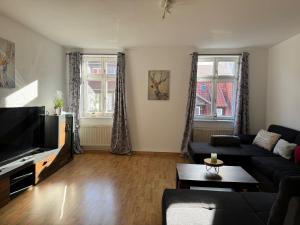 Μια τηλεόραση ή/και κέντρο ψυχαγωγίας στο Ferienwohnung Agora inkl Parkplatz