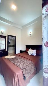 Ένα ή περισσότερα κρεβάτια σε δωμάτιο στο Seagull Lilly