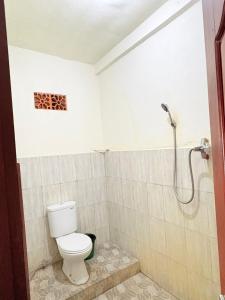 Koupelna v ubytování Sudi Homestay + 29 fotografií