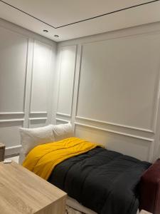 Ένα ή περισσότερα κρεβάτια σε δωμάτιο στο Naturalia Appart & Hotel - Casa Center