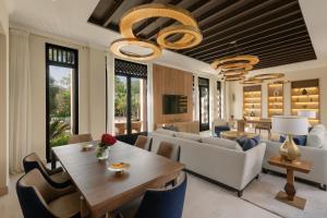 a dining room with a table and chairs at Four Seasons Resort Marrakech in Marrakech