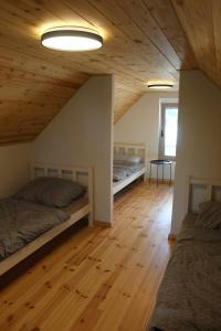 Ένα ή περισσότερα κρεβάτια σε δωμάτιο στο Luxus Vendégház a Szigetköz szívében