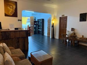 a living room with a couch and a table at Ardour Lodge "B" Wing in George Town